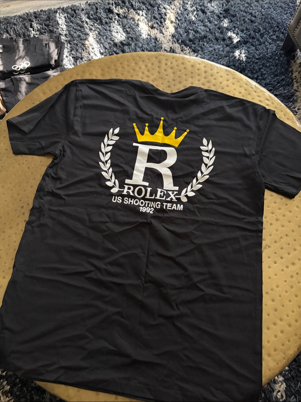 Rolex Black Tee with White Logo and Yellow Crown